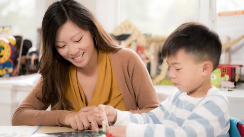 sheryll-working-mom-family-03073 Preschool child engaged in TigerKubz hand on learning kit for toddlers with activities that fosters the love of learning.